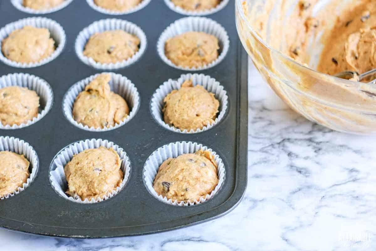 uncooked batter in muffin tin.