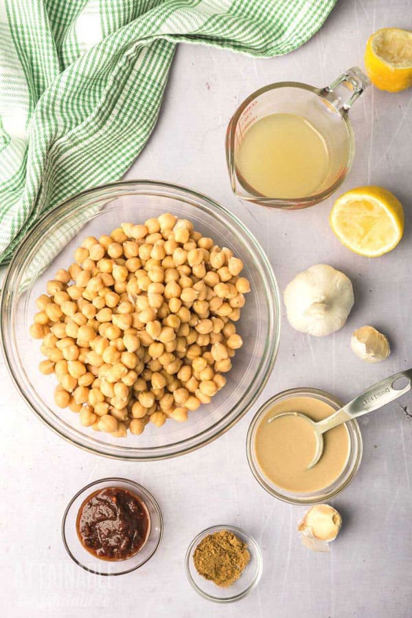 ingredients for making hummus: garbanzo beans, tahini, lemon juice, garlic