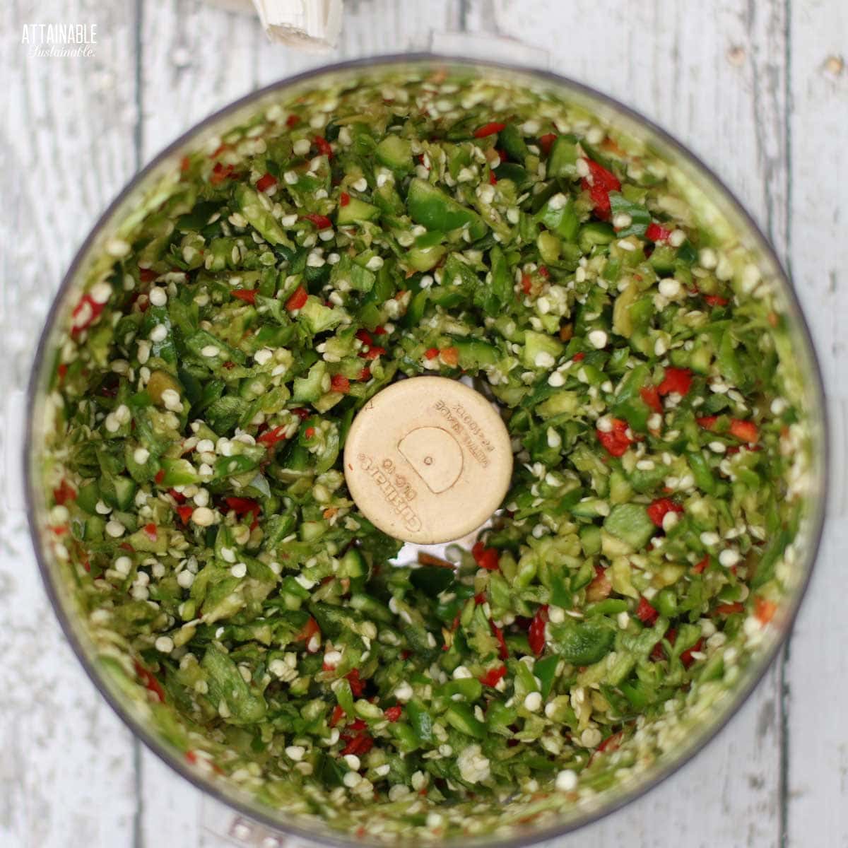 chopped peppers in a food processor, from above.