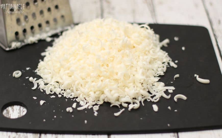 grated soap on a black cutting board