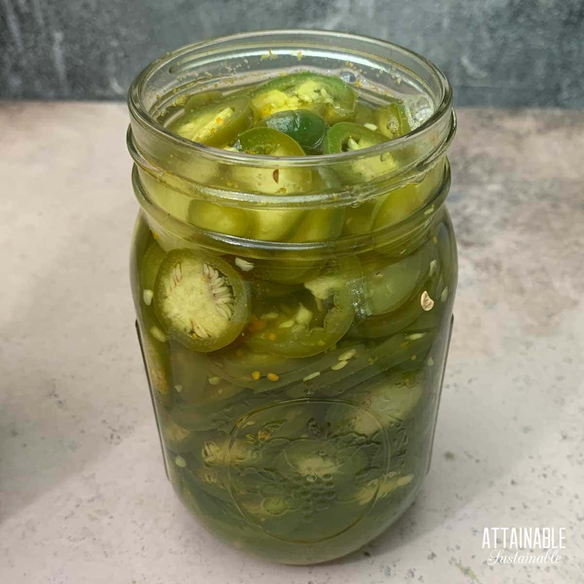 jar of pickled jalapeno peppers.