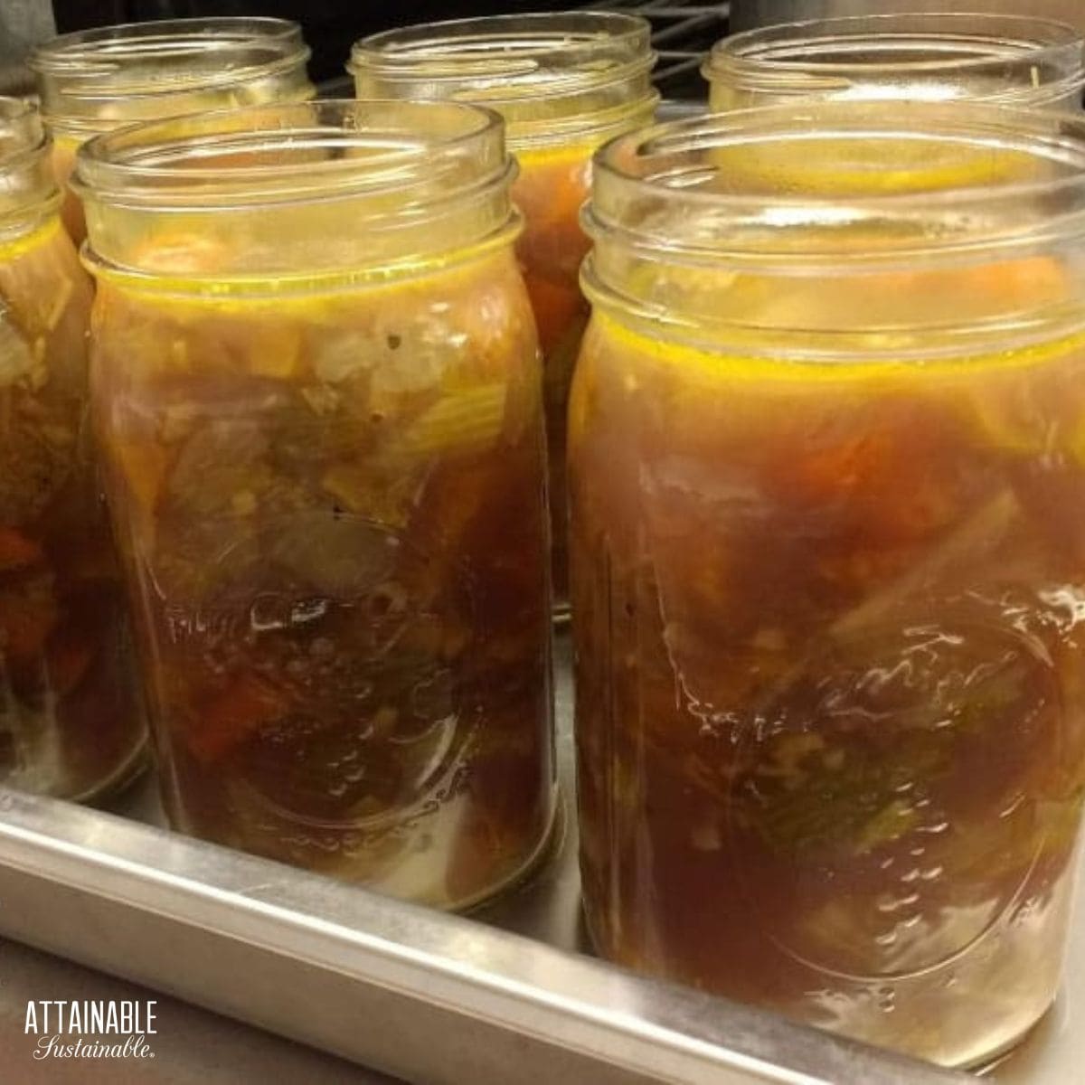 jars of stew, lids off, ready for pressure canning.