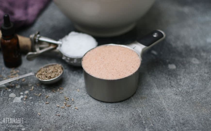 lavender petals, coconut oil, pink salt in measuring devices