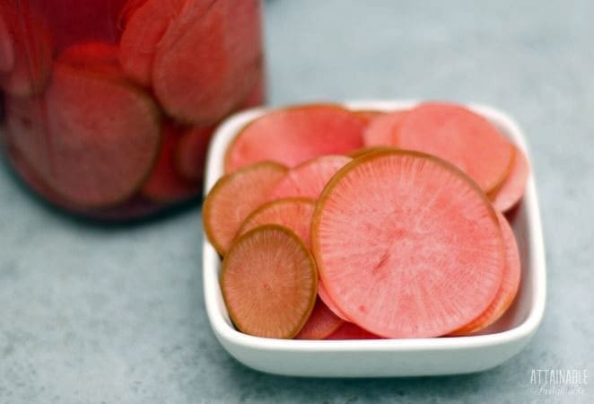 square white dish with pink sliced vegetables