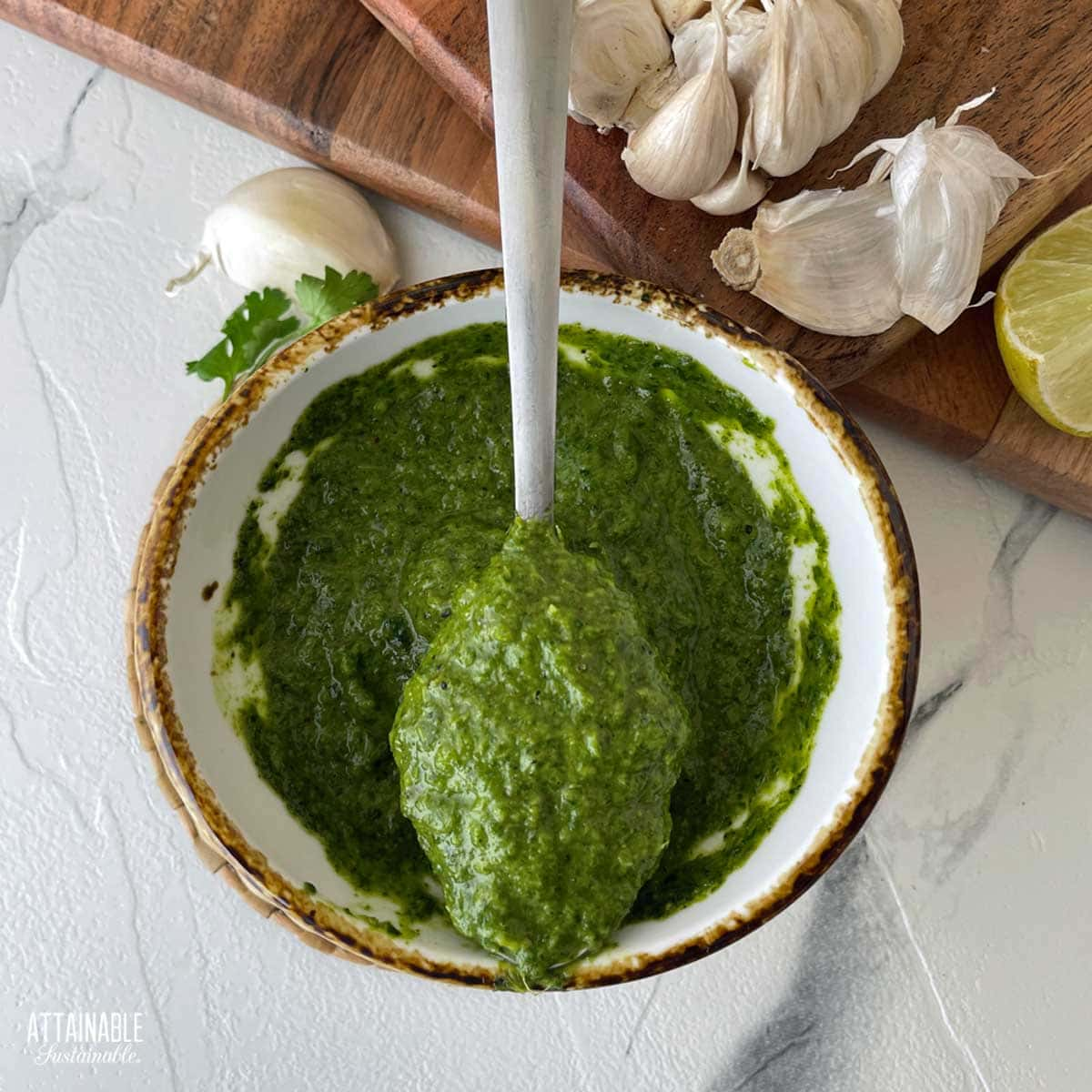 cilantro sauce on a spoon.