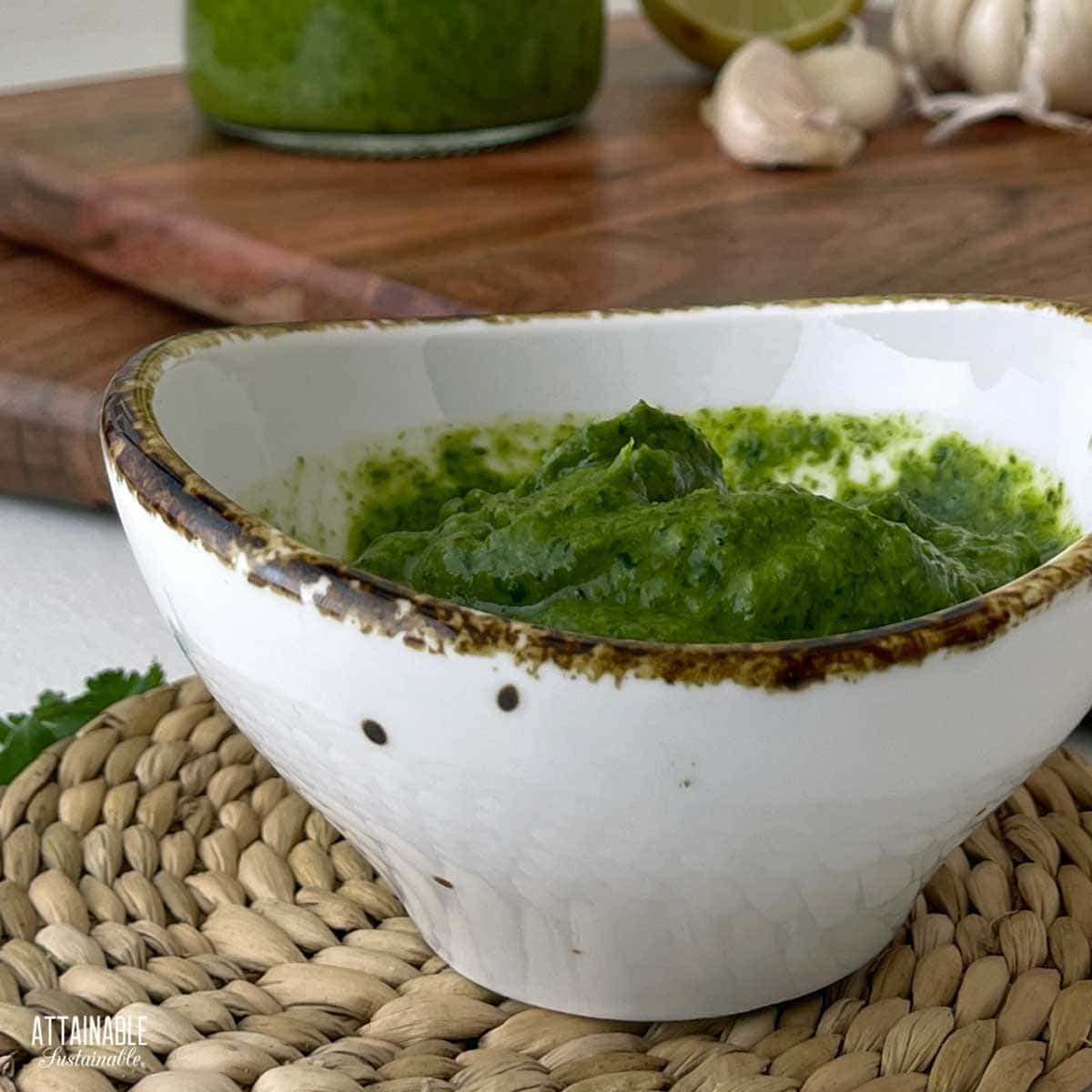 white pottery bowl with cilantro lime sauce.