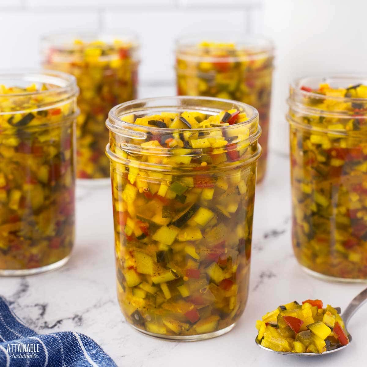 jars of zucchini relish, ready for lids.