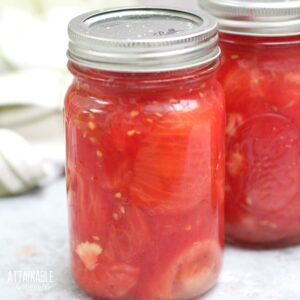 canning jar with tomatoes.