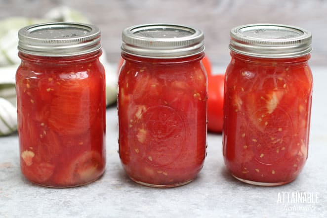 3 jars of crushed tomatoes in canning jars