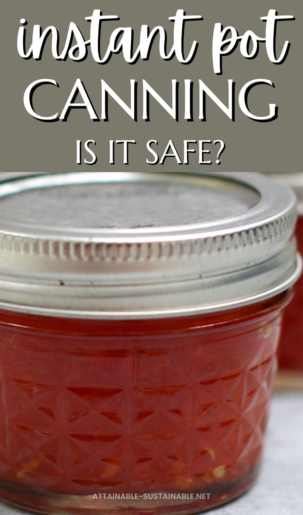 close up of canning jar full of red jam