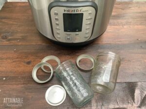 instant pot with canning jars and lids