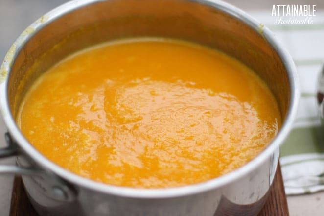 pot full of yellow fruit puree