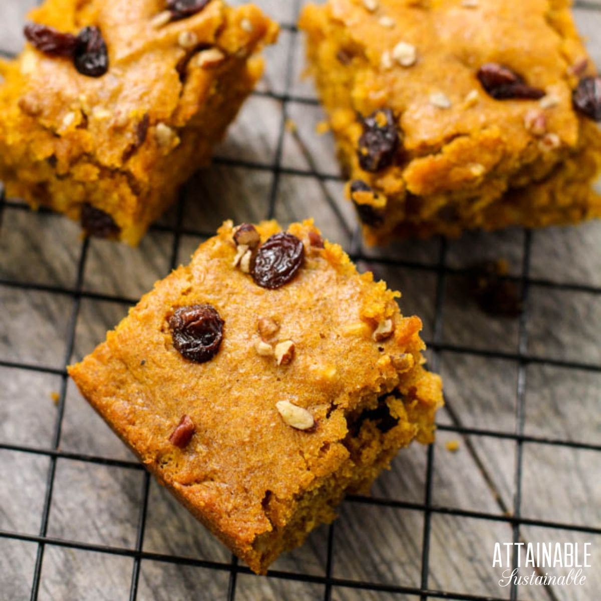 pumpkin spice bars on a black wire rack.