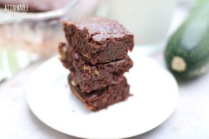 stack of brownies on a white plate