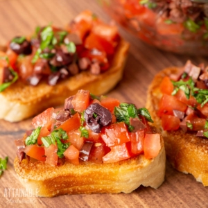 tomato mixture on crispy toasts.