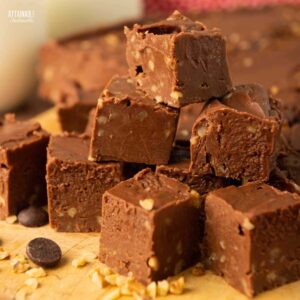 squares of chocolate fudge in a stack.