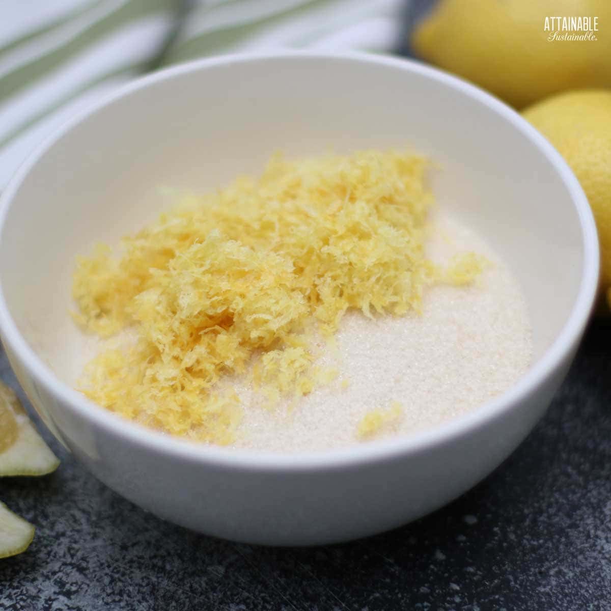 lemon zest and sugar in a white bowl.