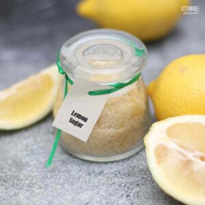 small glass jar full of lemon sugar.