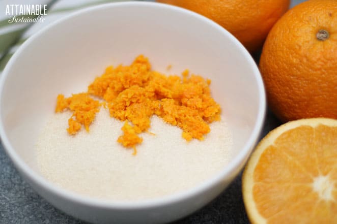 white bowl filled with sugar and orange zest