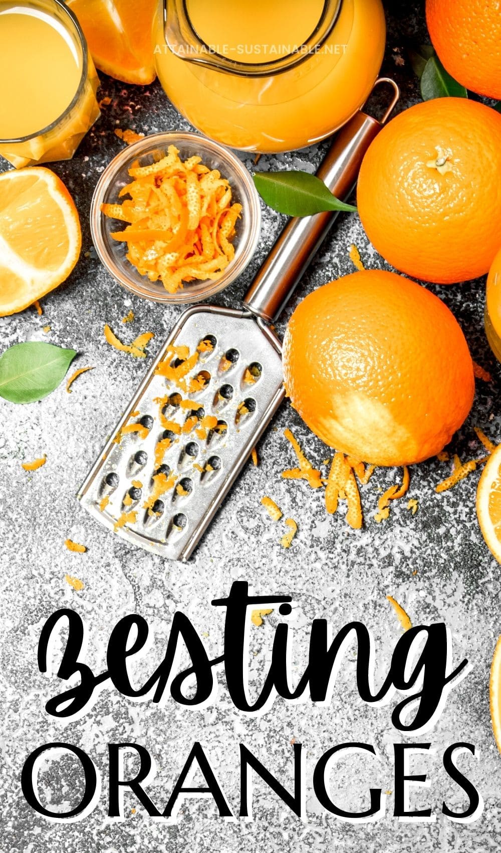 vignette of fresh oranges, with juice and grater and zest