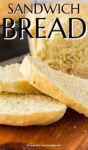close up of sliced sandwich bread, loaf behind