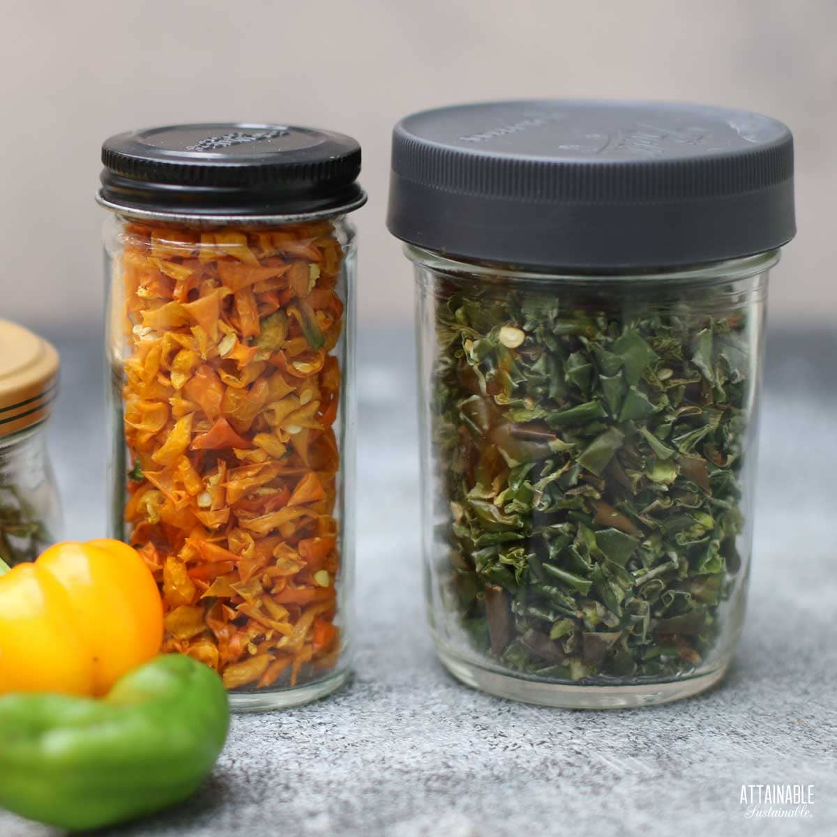 3 jars of dried peppers, yellow and green.