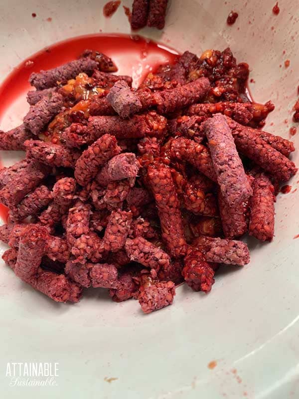 small dried "logs" of pulp and seed from a food mill