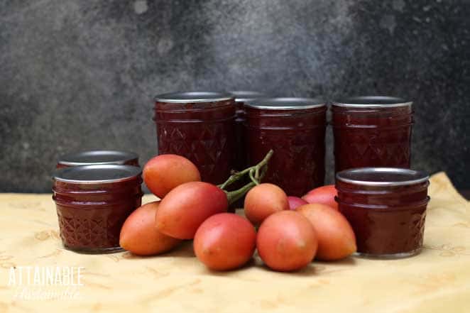 jars of red jam with tamarillo fruit