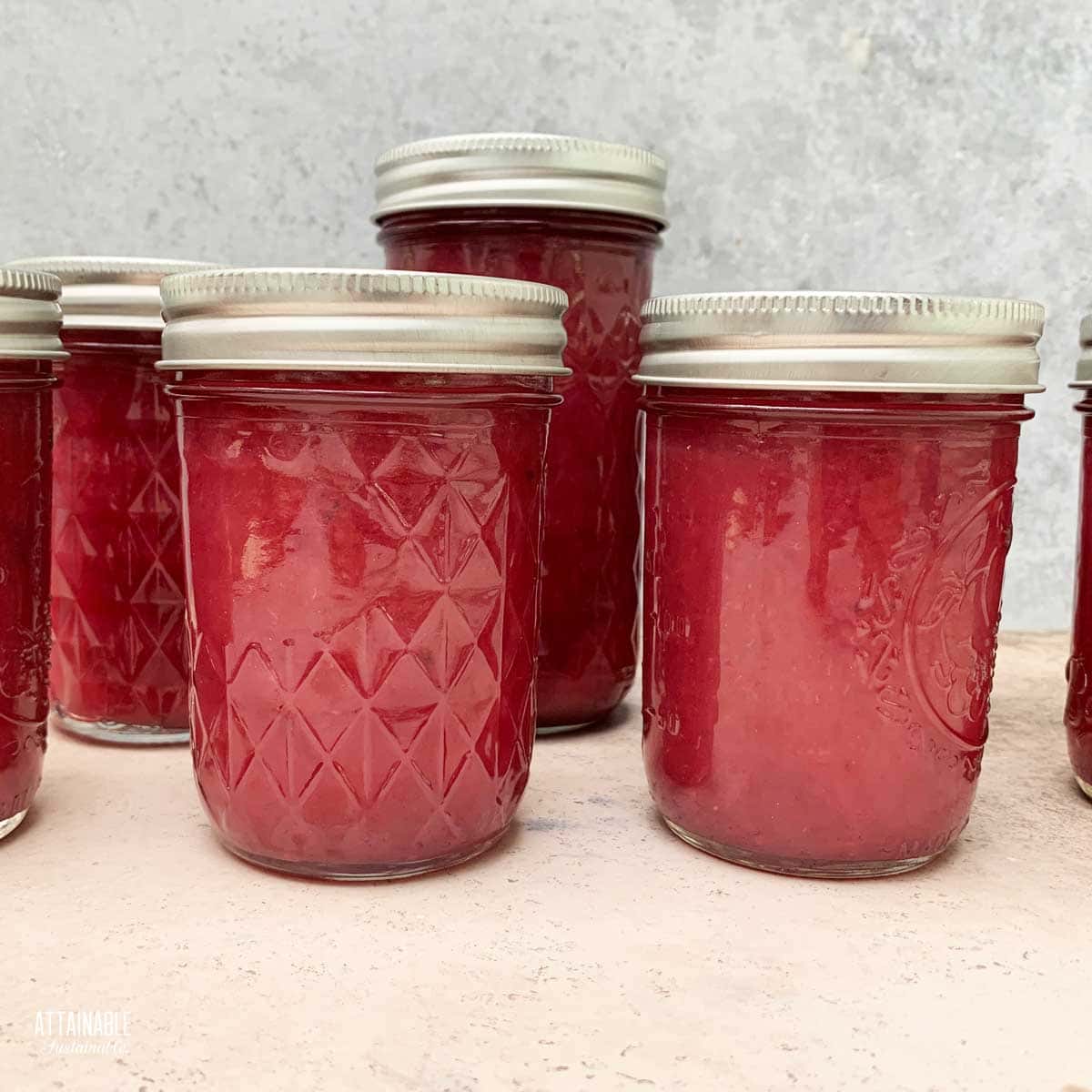 jars of pink jaboticaba jam.