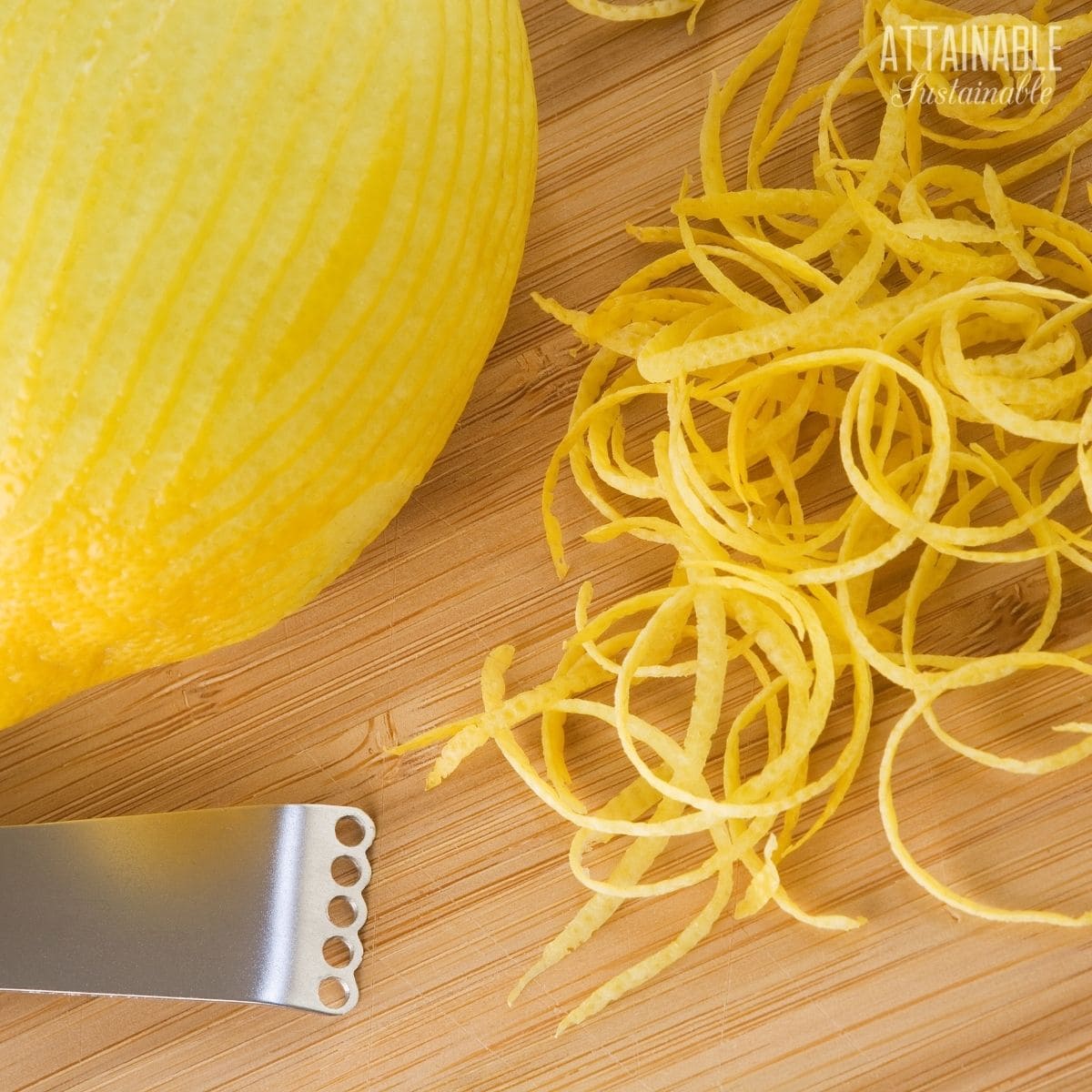 lemon zester with curls of lemon.