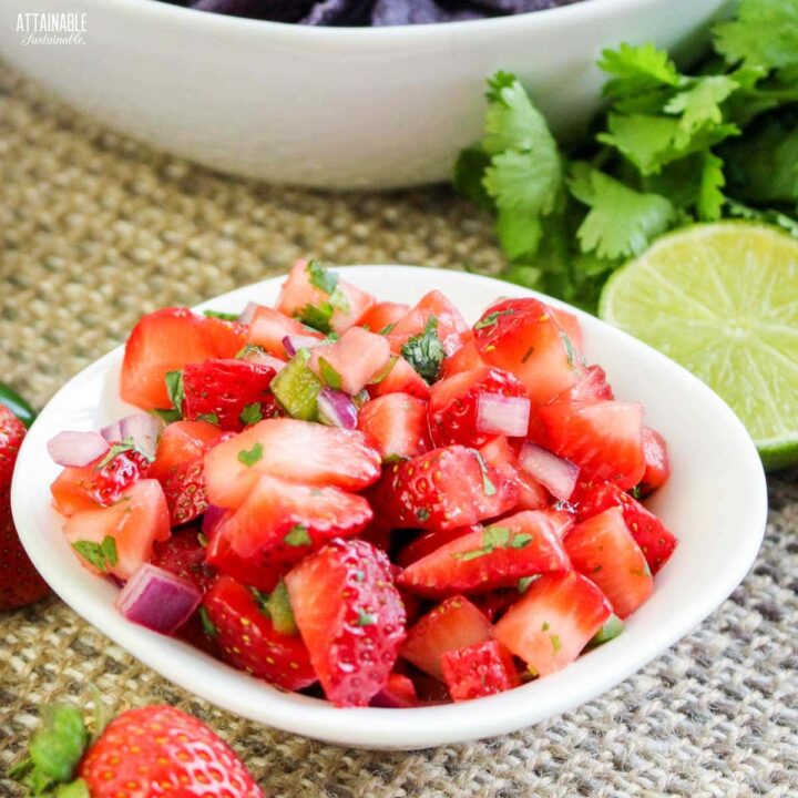 chopped strawberry salsa in a white dish.