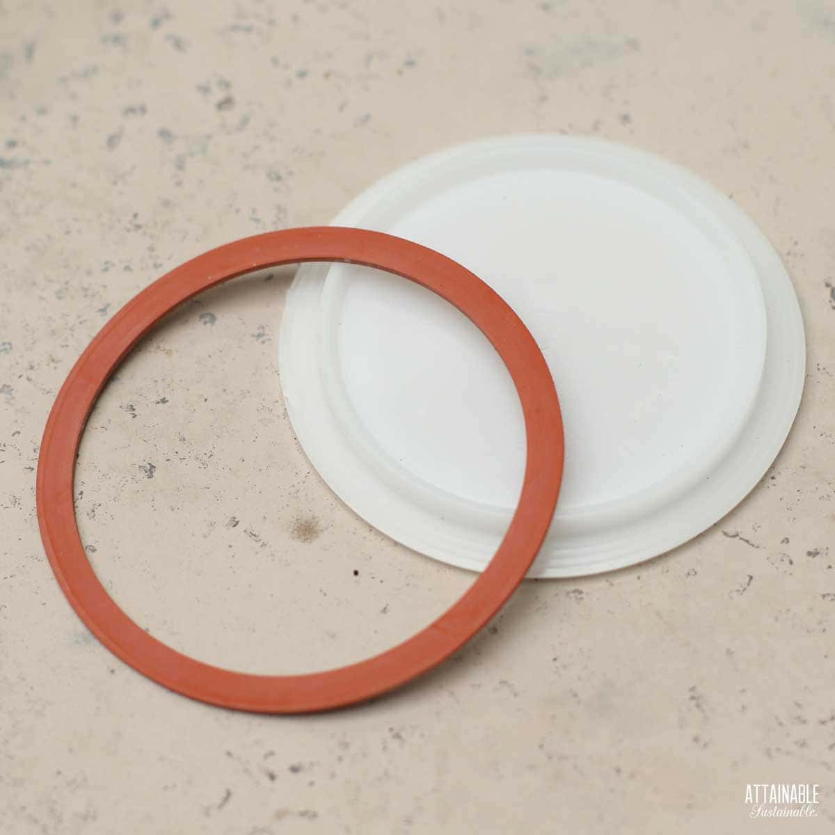 plastic canning lid with a separate rubber ring. 