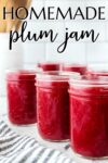 jars of plum jam on a counter, ready for canning lids.