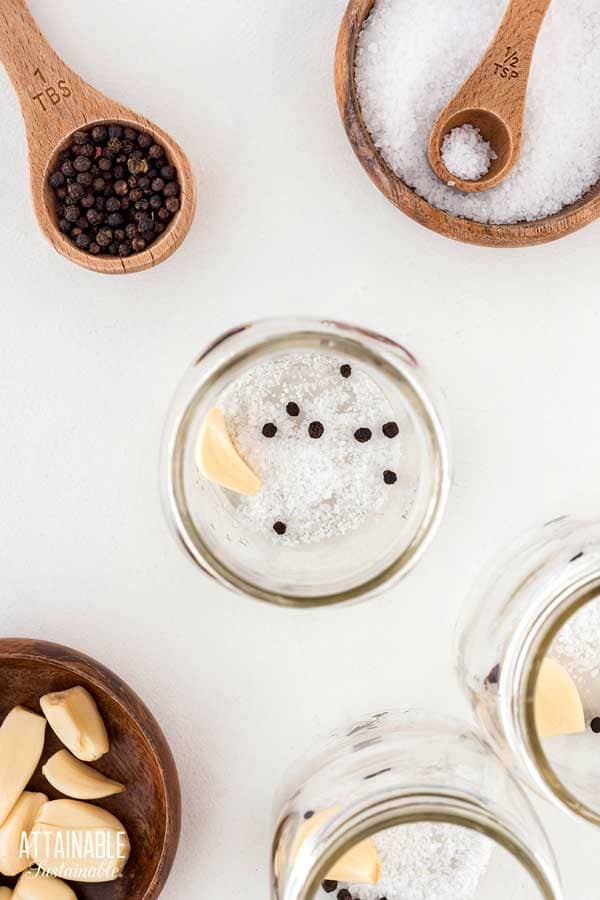 salt and peppercorns in a canning jar from above.