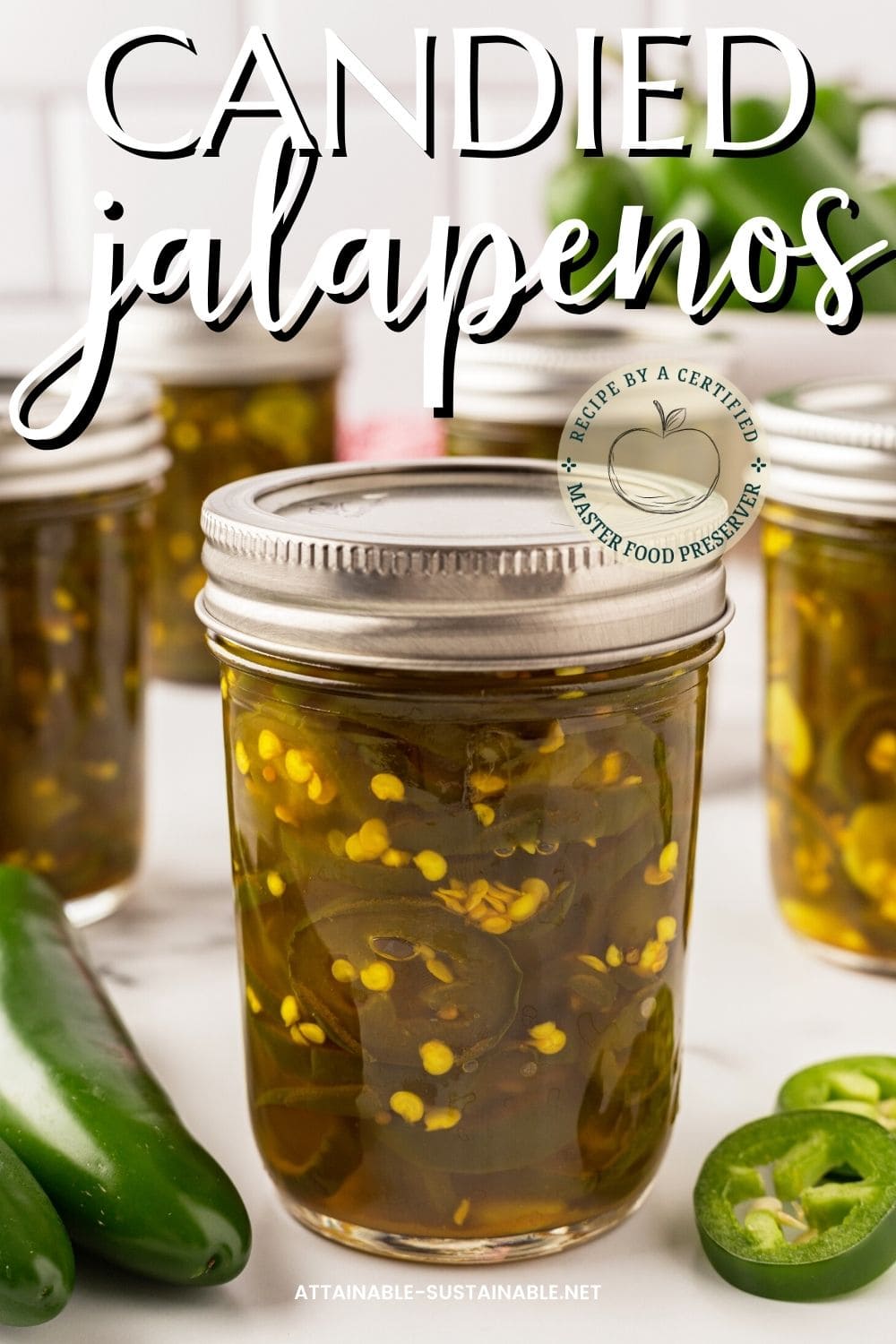 jars of home canned candied jalapeno peppers.