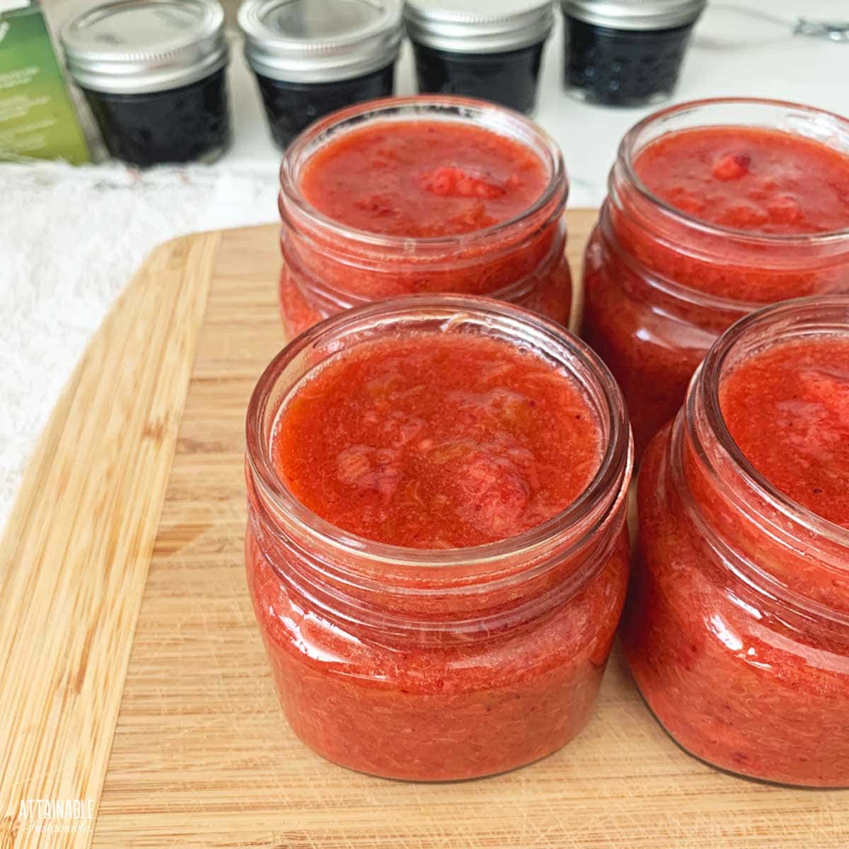 4 jars of strawberry rhubarb jam, no lids.