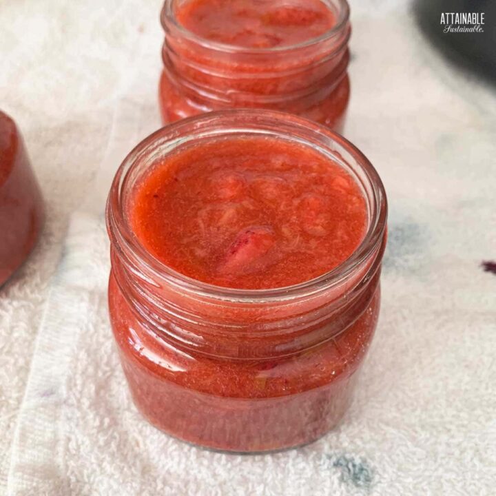 jars of strawberry rhubarb jam, before setting lids in place.