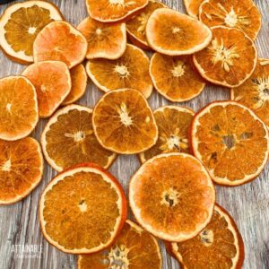 dried oranges on a wooden board.