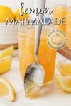 jar of lemon marmalade with a spoon leaning on it.