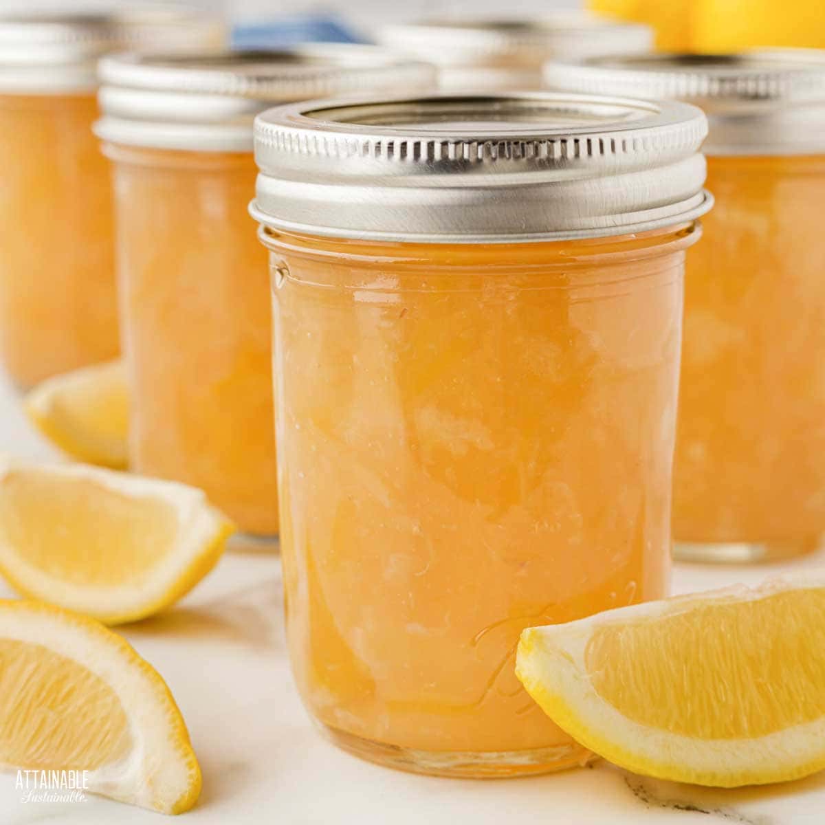 jars of home canned lemon marmalade.