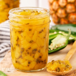 canning jar of pineapple jalapeno jam, lid off.