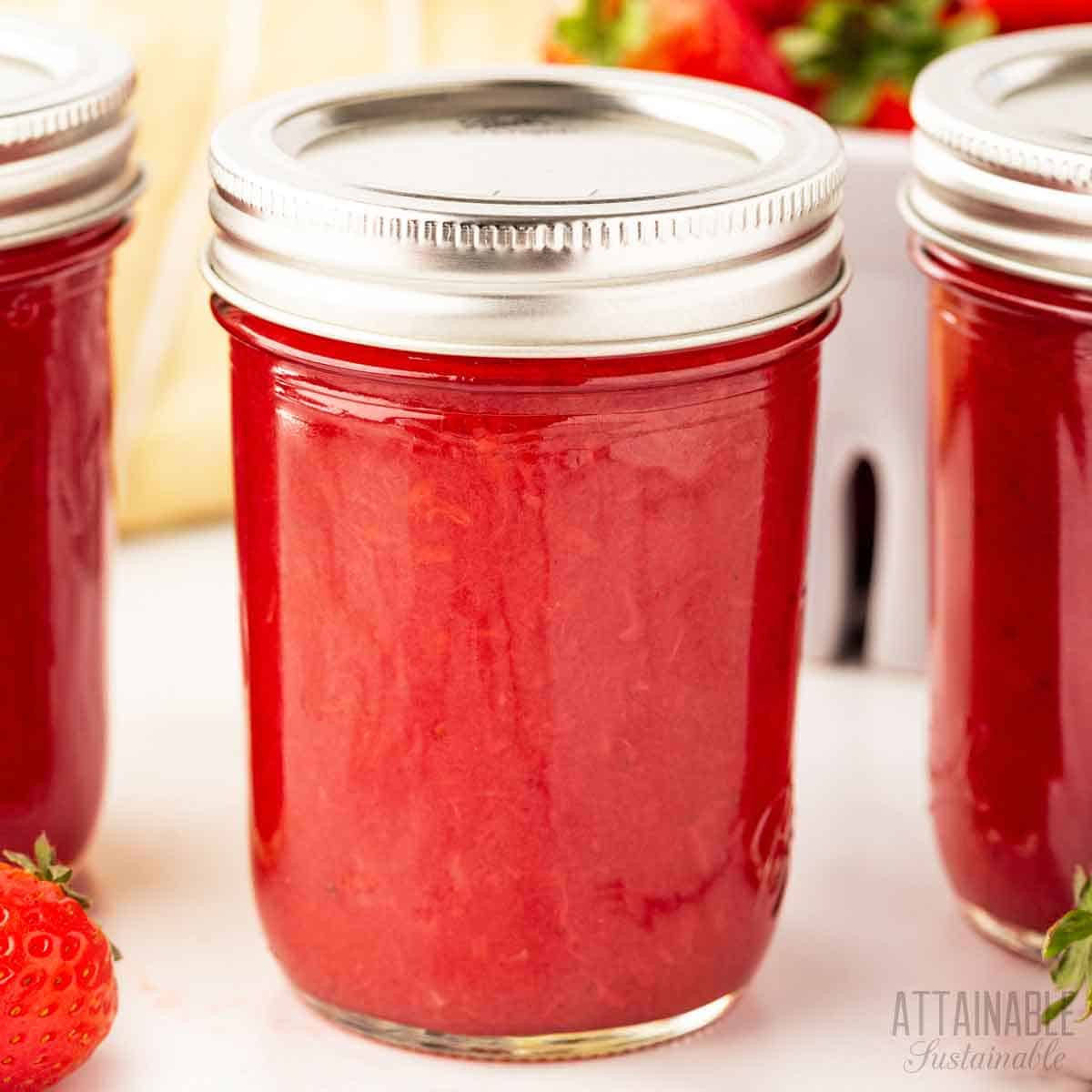 jar of strawberry puree with lid and ring in place.