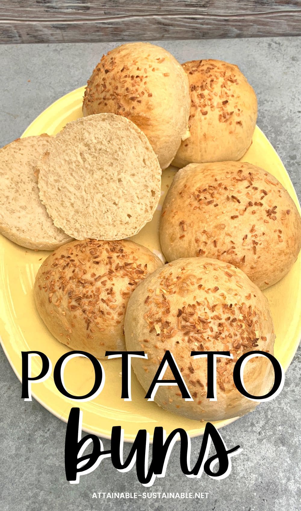 yellow plate of potato buns, one sliced open showing the white fluffy center.