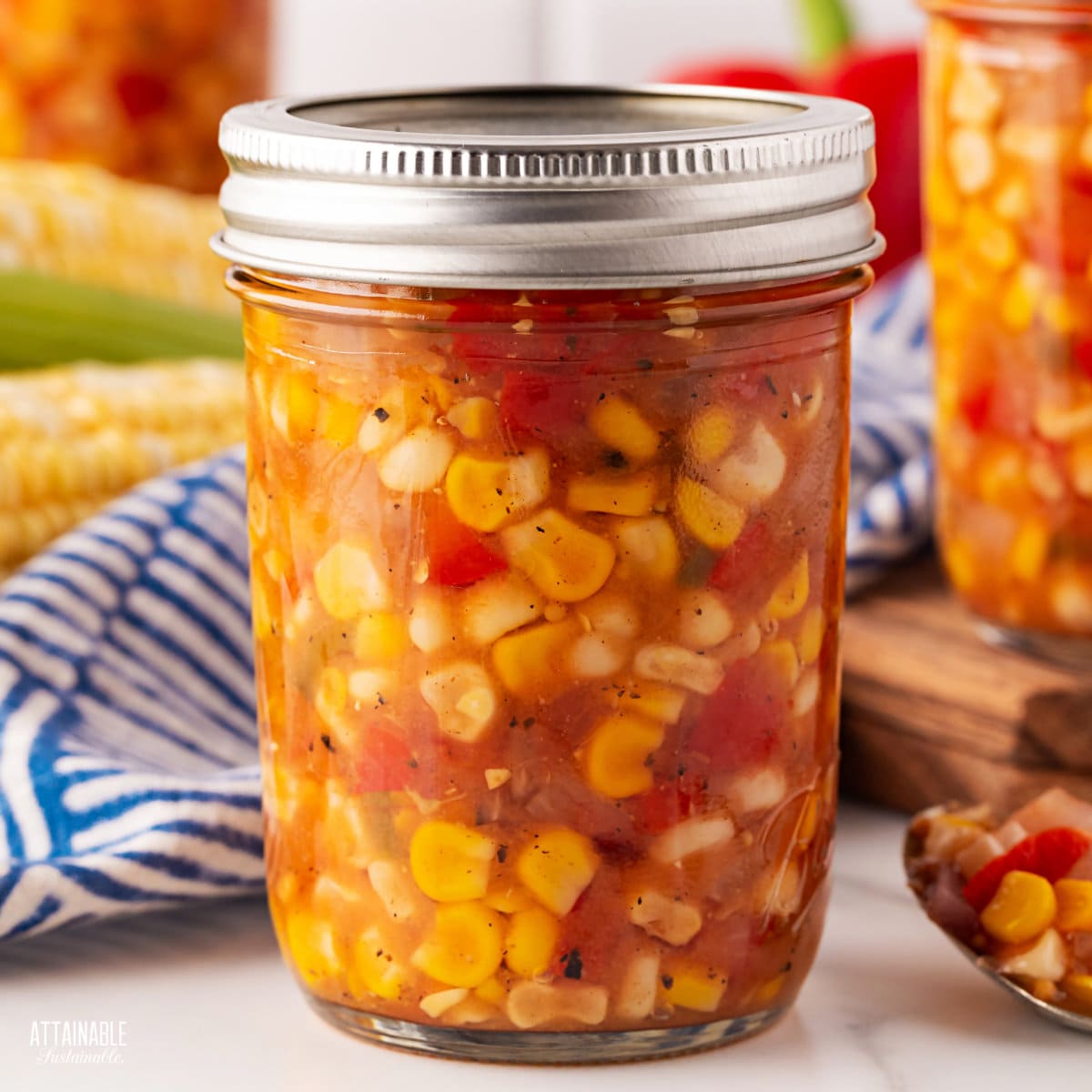 pint sized canning jar full of corn relish.